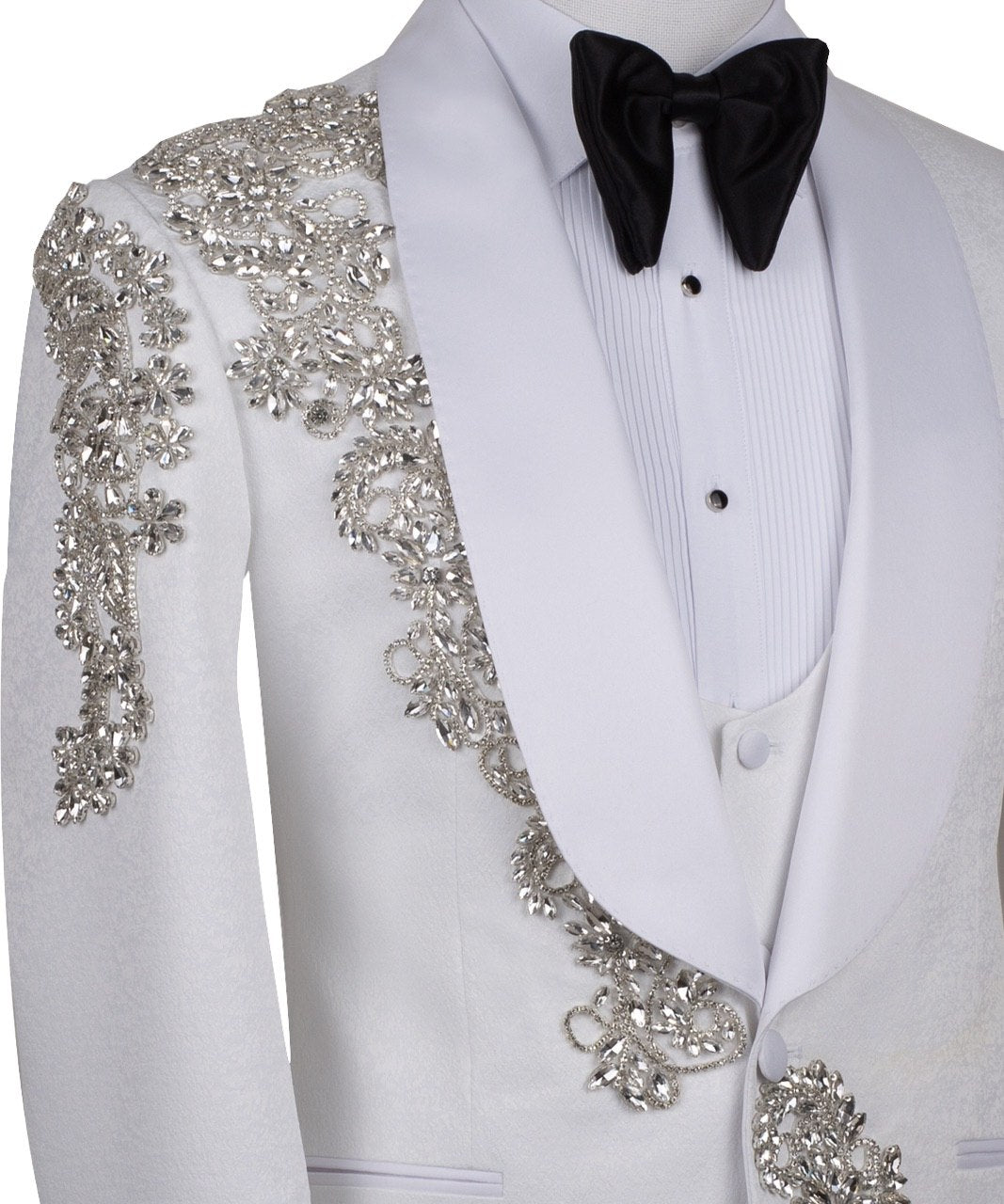 White hand-embellished jacquard three-piece tuxedo with crystal detailing on jacket and white satin shawl lapel. Master tailored in Istanbul for luxury events and weddings.