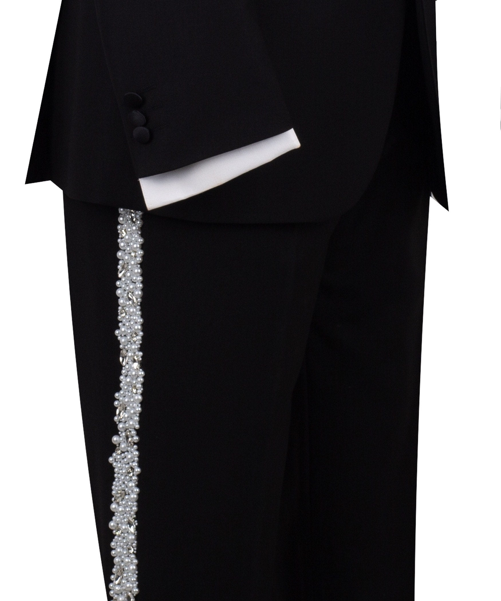 Full front view of a black three-piece tuxedo on a mannequin, featuring heavily hand-embellished shawl lapels with pearls and crystals, and a matching embellishment down the side of the trousers. Includes a black double-breasted vest and a white shirt with a black bow tie (not included).