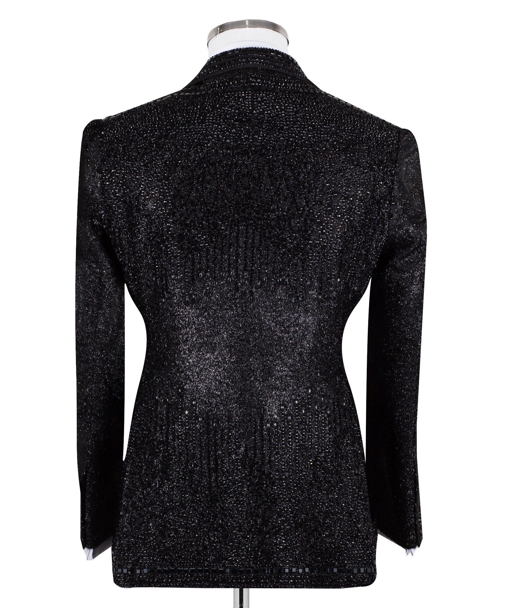 Front view of a black hand-embellished three-piece tuxedo by Charly Luxury, featuring a single-breasted jacket with satin shawl lapels and a double-breasted vest, showcased on a mannequin.