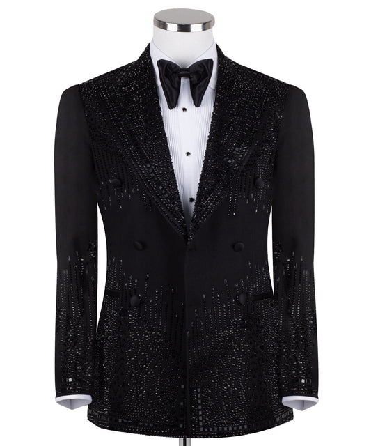 Charly Luxury black double-breasted tuxedo jacket with intricate hand-embellished crystal and bead detailing on lapels, shoulders, chest, sleeves, and back, displayed on a mannequin, front and back views, close-up of embellishments.