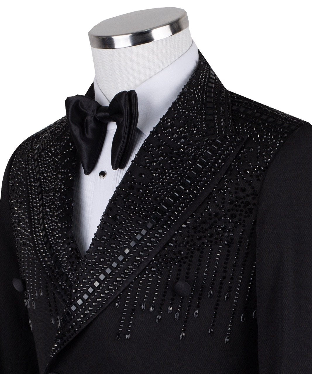 Charly Luxury black double-breasted tuxedo jacket with intricate hand-embellished crystal and bead detailing on lapels, shoulders, chest, sleeves, and back, displayed on a mannequin, front and back views, close-up of embellishments.