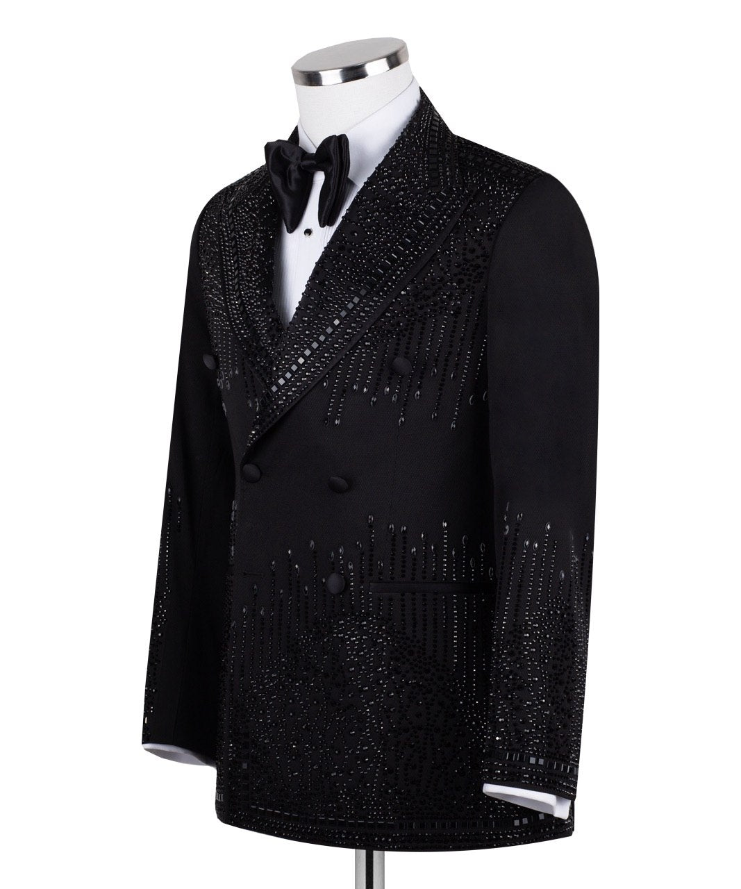 Charly Luxury black double-breasted tuxedo jacket with intricate hand-embellished crystal and bead detailing on lapels, shoulders, chest, sleeves, and back, displayed on a mannequin, front and back views, close-up of embellishments.