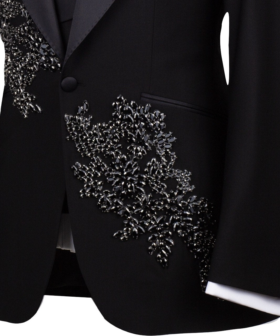 Charly Luxury Black Embellished Three-Piece Tuxedo. Handcrafted single-breasted jacket with peak lapel and shimmering crystal embellishments. Includes matching double-breasted vest and trousers.