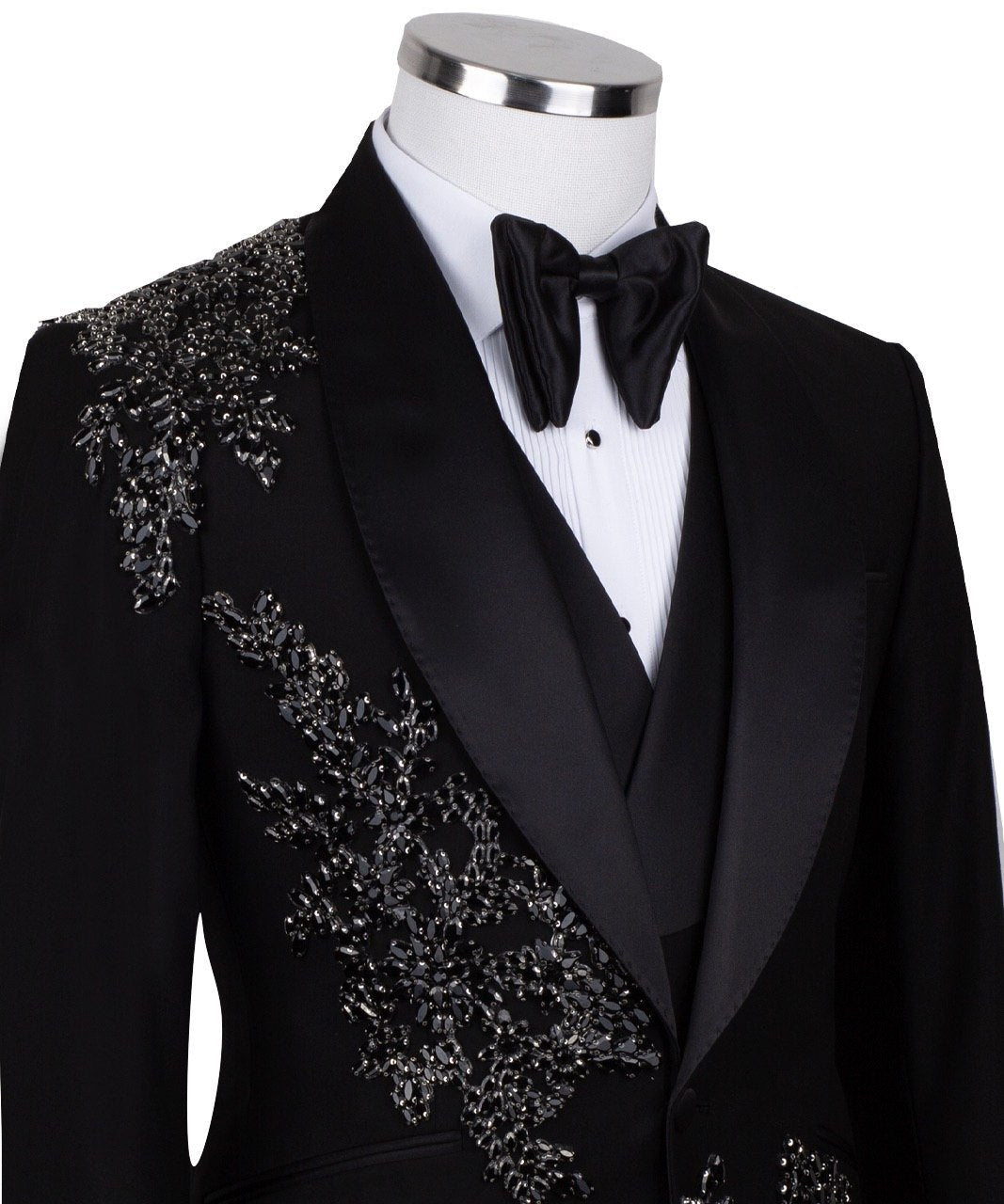 Charly Luxury Black Embellished Three-Piece Tuxedo. Handcrafted single-breasted jacket with peak lapel and shimmering crystal embellishments. Includes matching double-breasted vest and trousers.