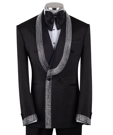 Black double-breasted tuxedo jacket with intricate silver hand-embellished shawl lapels, front detail, and cuffs, paired with black satin stripe trousers on a mannequin. From Charly Luxury, handcrafted in Istanbul.