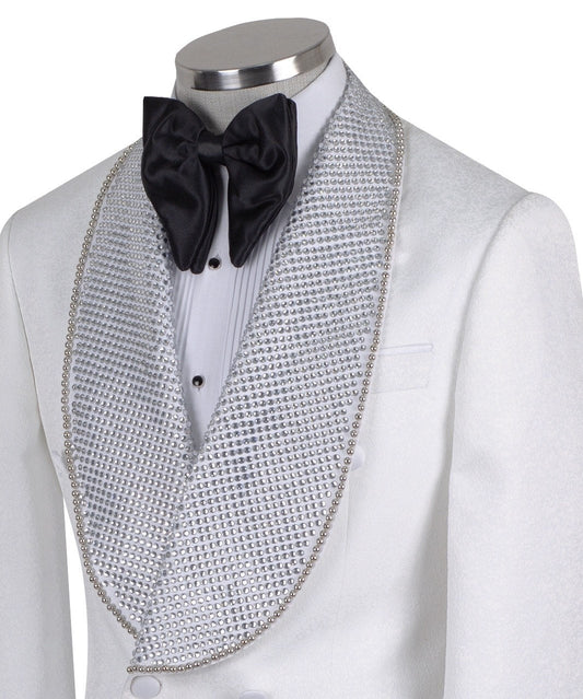 Full shot of a white double-breasted tuxedo with silver crystal-embellished shawl lapels and black trousers with satin stripes, displayed on a mannequin. Handcrafted luxury suit from Charly Luxury.