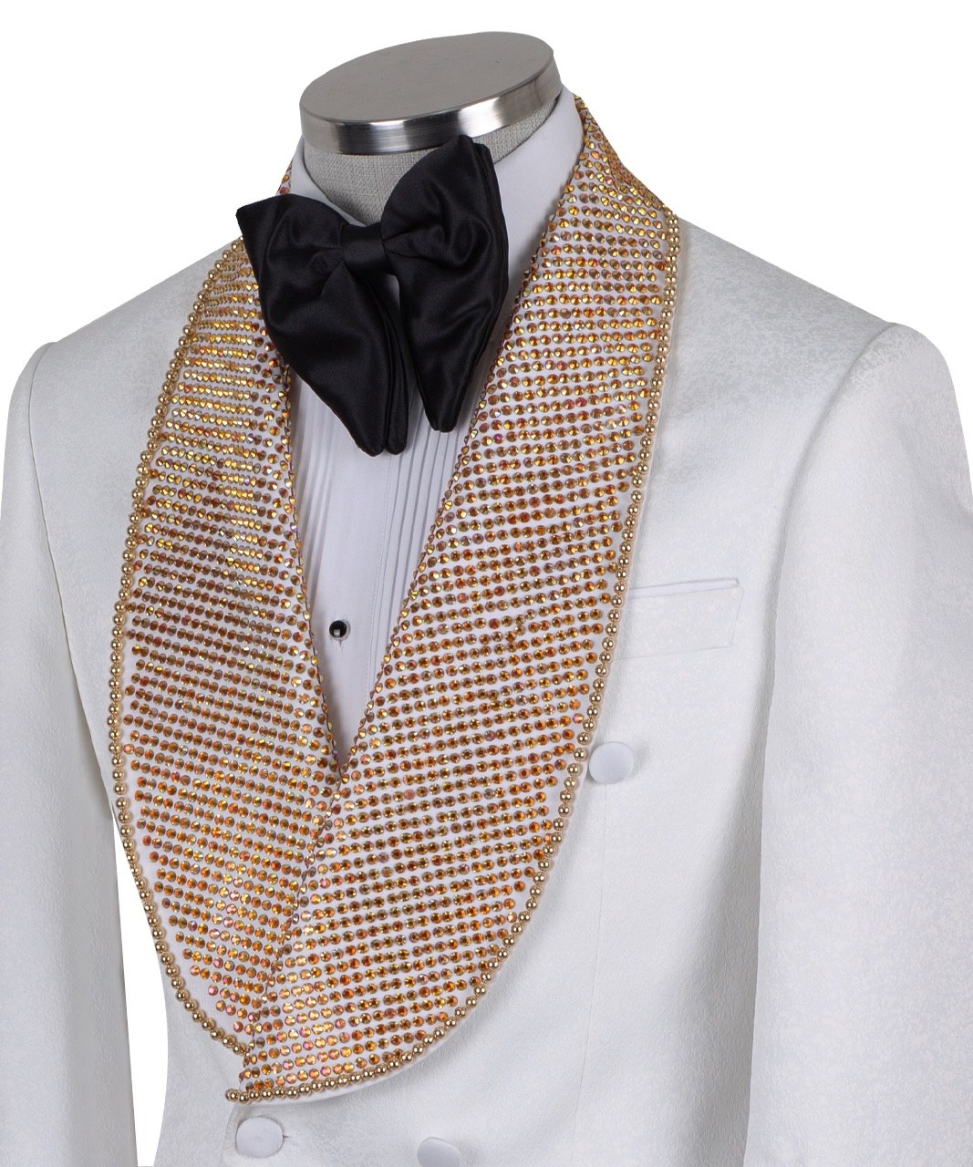 White double-breasted tuxedo jacket with golden hand-embellished shawl lapel and black tuxedo trousers, masterfully tailored in Istanbul by Charly Luxury.