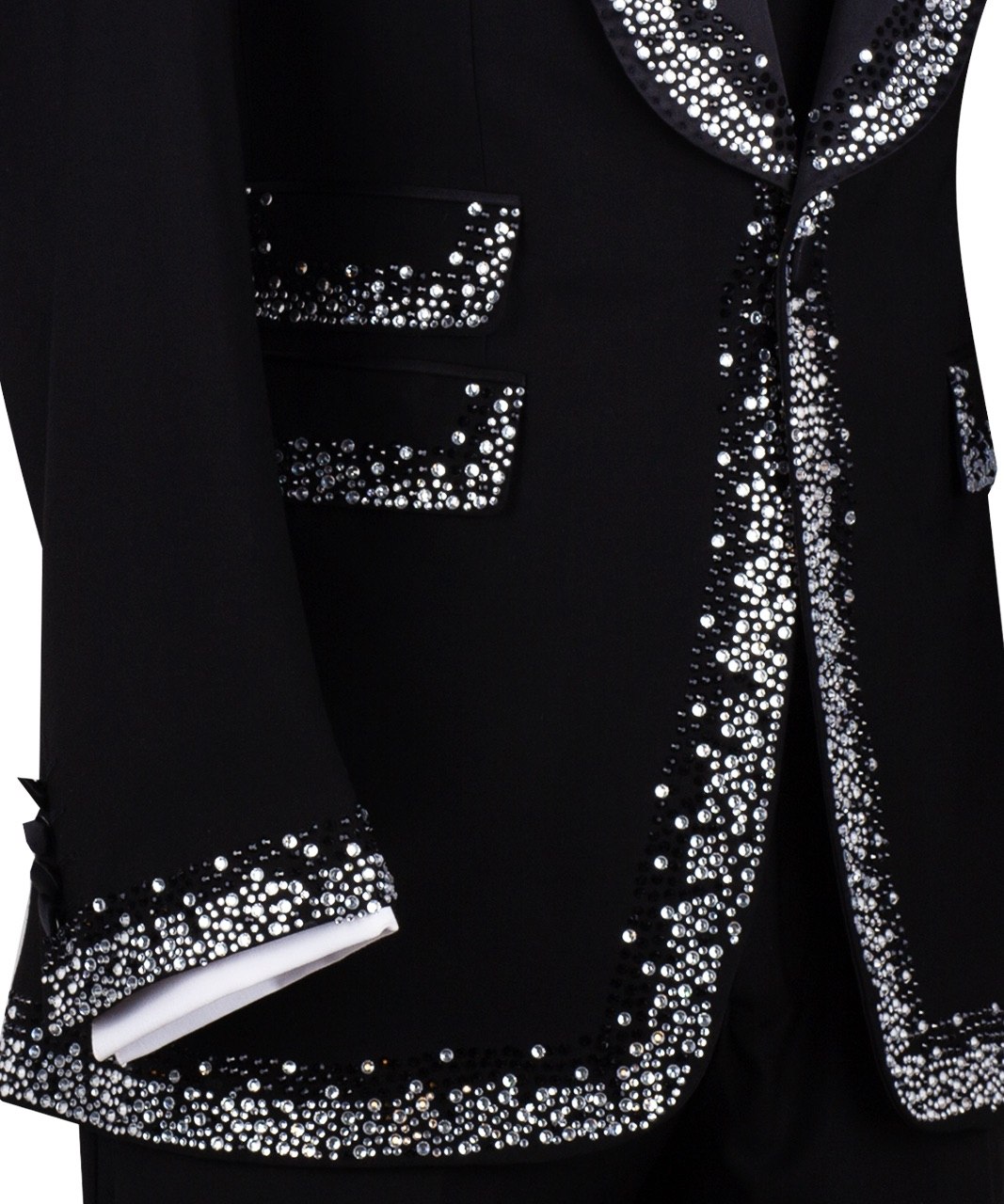 Charly Luxury Black Embellished Shawl Lapel Tuxedo, featuring shimmering silver crystals hand-embellished on lapels, shoulders, pockets, and cuffs. The tuxedo includes a black single-breasted jacket, matching vest, and trousers, displayed on a mannequin. This luxury evening wear is handcrafted in Istanbul, showcasing master tailoring and intricate crystal detailing for a glamorous, statement look.