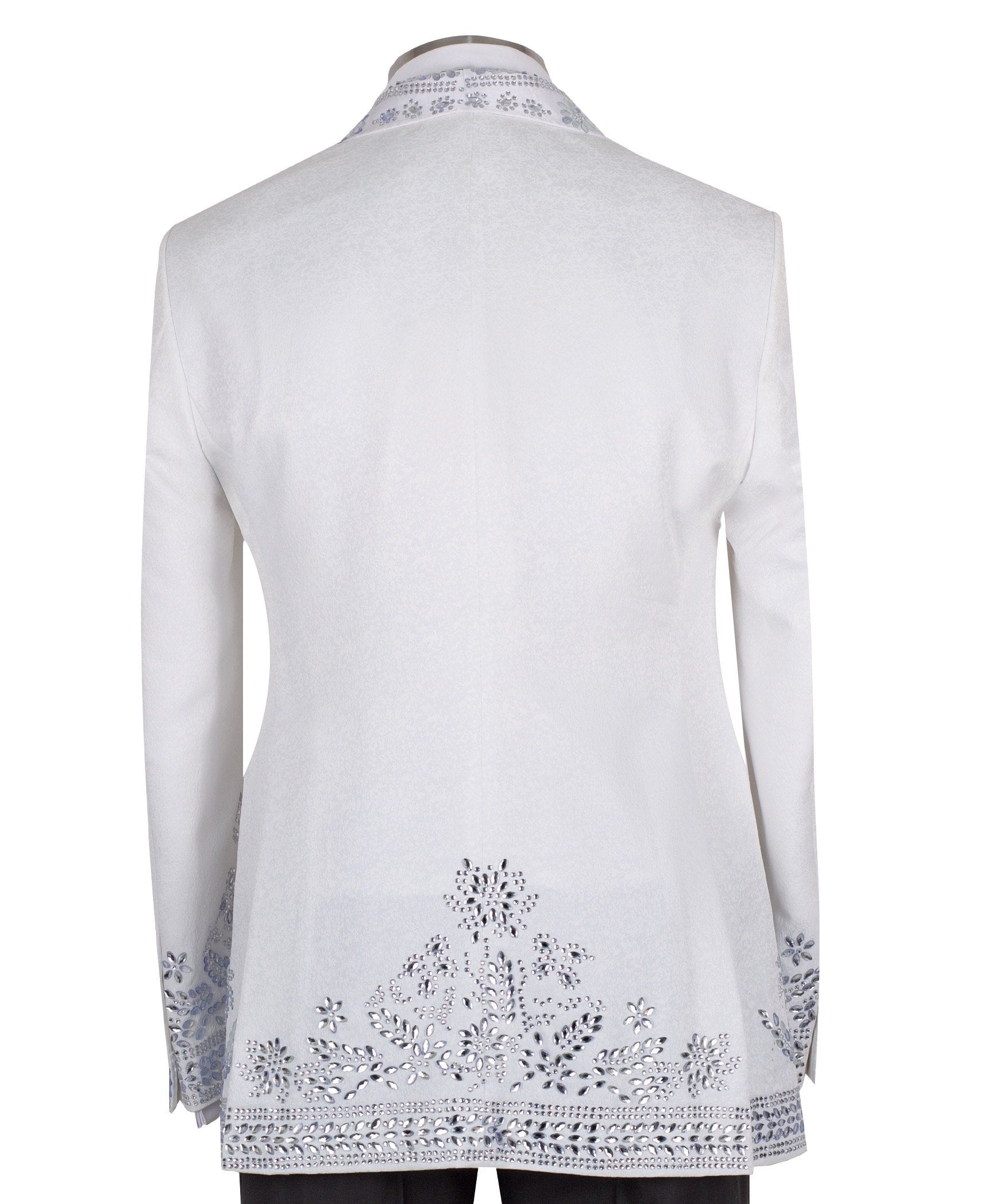 Front view of a white heavily embellished three-piece tuxedo with silver sequins and beadwork, featuring a shawl lapel and a matching white vest, displayed on a mannequin. Handmade in Istanbul.