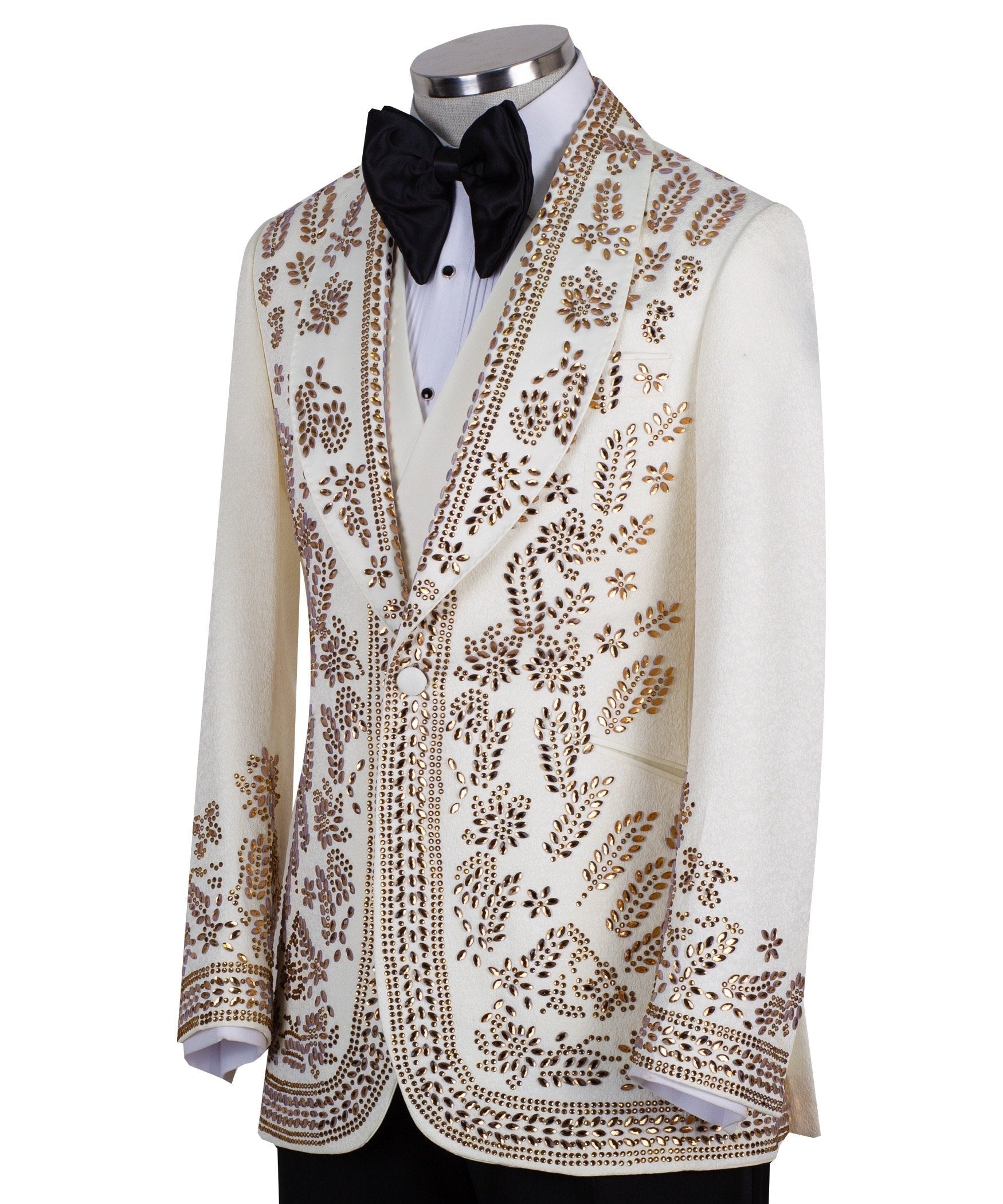 Cream and gold hand-embellished tuxedo jacket, vest, and black trousers from Charly Luxury, handcrafted in Istanbul. Features intricate floral metallic stud detailing on a slim-fit, peak lapel design.