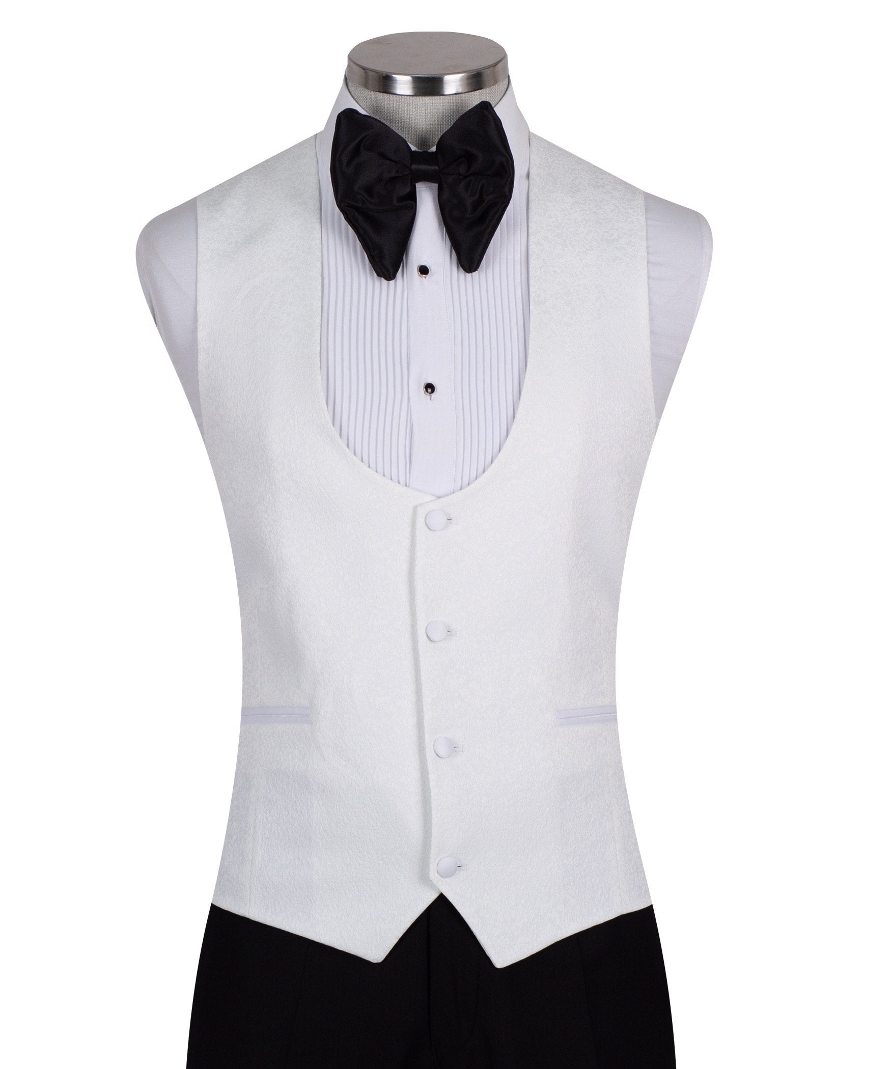 Front view of a white jacquard patterned single-breasted tuxedo jacket with a white satin shawl lapel, displayed on a mannequin. Includes a matching white jacquard vest and black trousers. Handmade in Istanbul luxury bespoke menswear.
