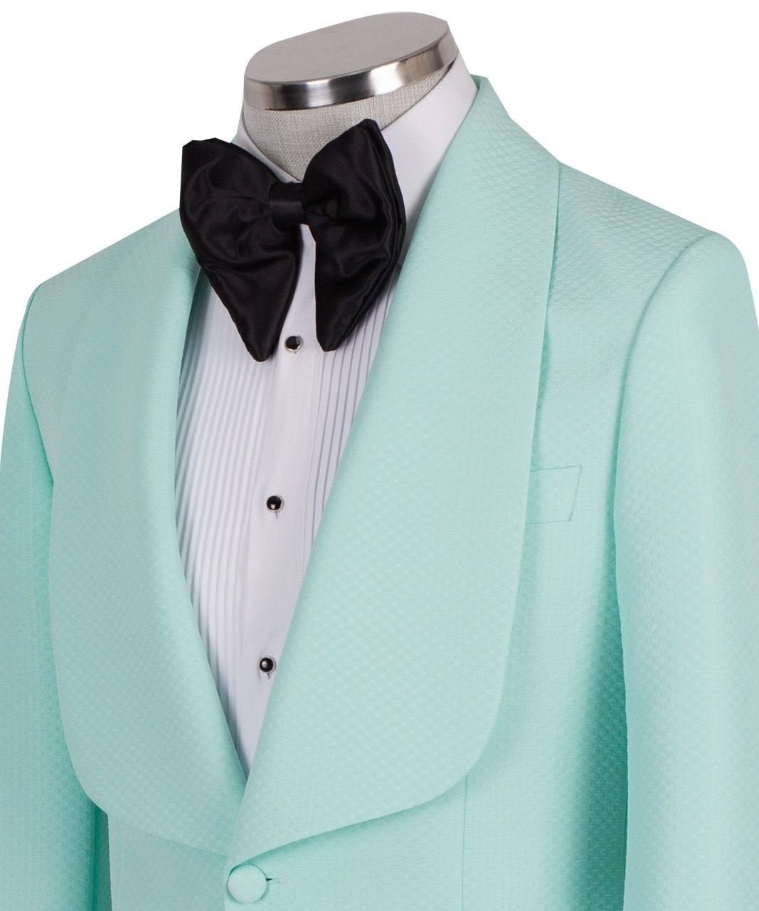 Aqua textured fabric shawl lapel tuxedo jacket on a mannequin, single-breasted, one-button closure. Showcase of Charly Luxury's luxury handcrafted Istanbul tailoring.