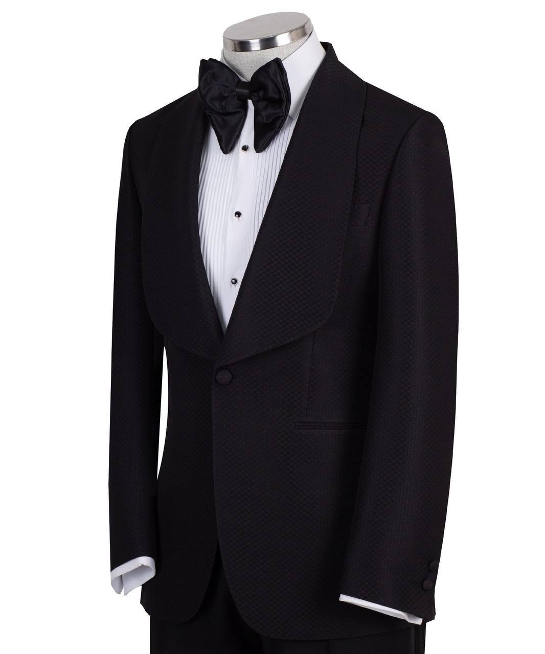 Black single-breasted tuxedo with subtle jacquard pattern and elegant shawl lapel, handcrafted in Istanbul by Charly Luxury, front view on mannequin.