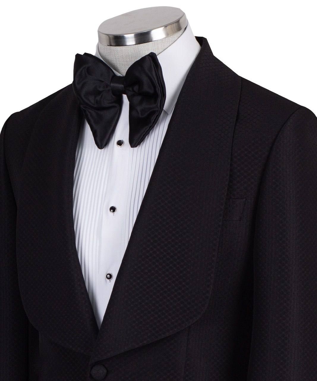 Black single-breasted tuxedo with subtle jacquard pattern and elegant shawl lapel, handcrafted in Istanbul by Charly Luxury, front view on mannequin.